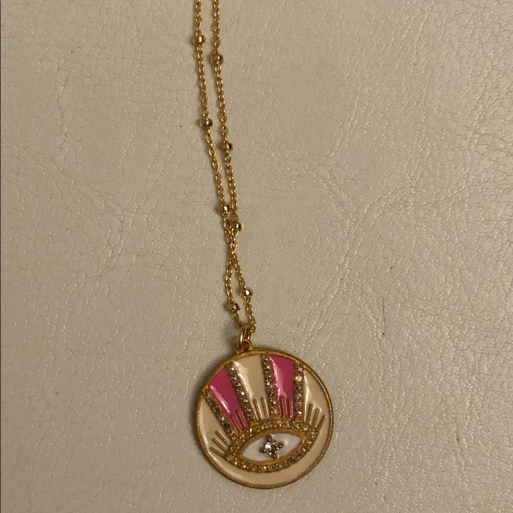 Sennod Pink eye gold necklace and charm